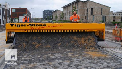 This machine prints paved roads like a carpet