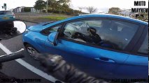 Car almost rear ends biker!