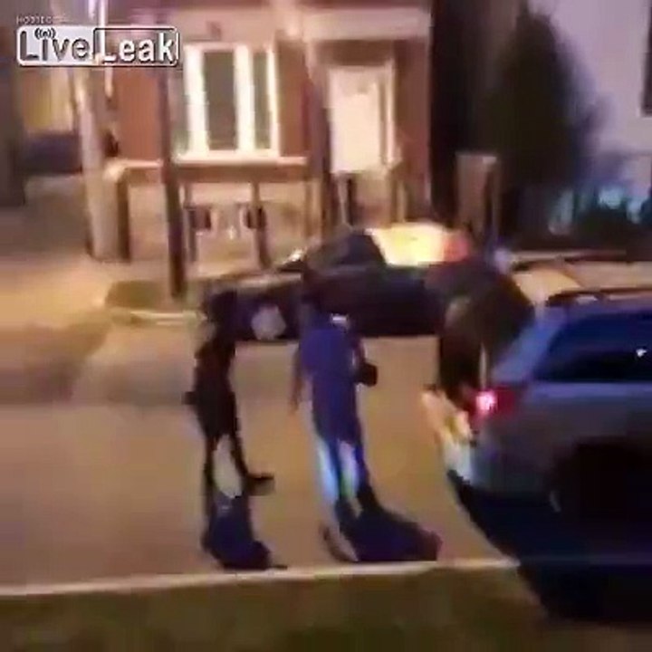 Man hits back of car, and gets knocked out by a bucket