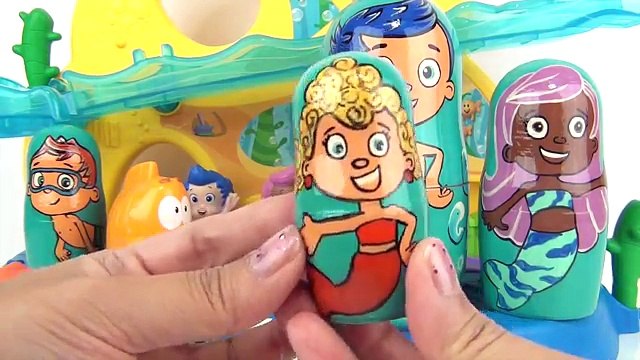 BUBBLE GUPPIES Nesting Matryoshka Dolls, Stackable Cups with Toy Surprises like Playdoh Eggs / TUYC