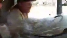 Holy Cow, That's Some Deep Water This Trucker Is Driving Through