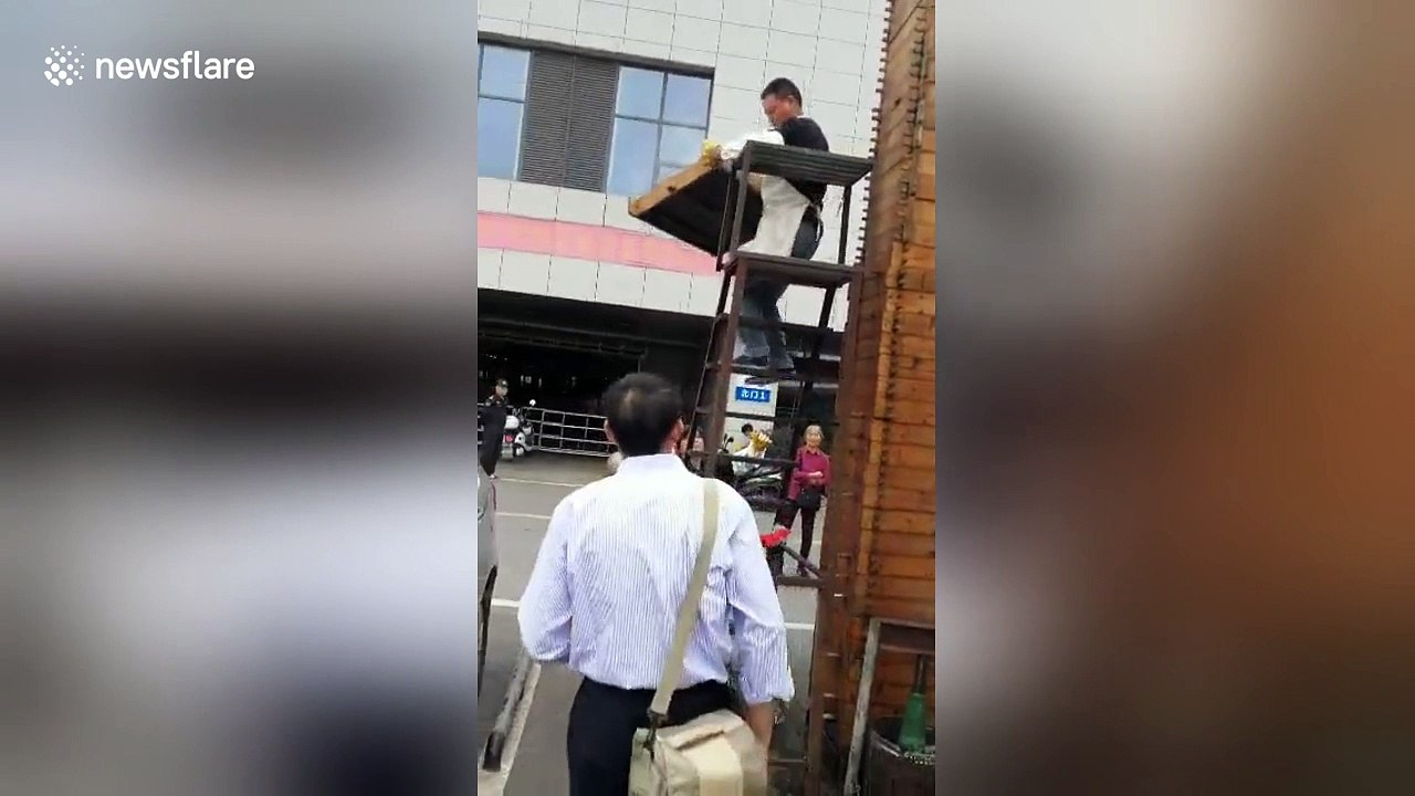 Couple produce huge tower of steamed buns
