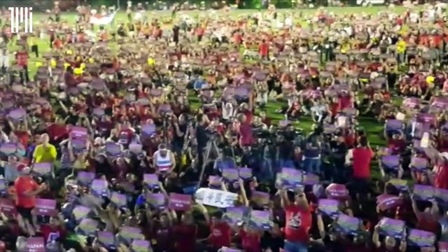 Thousands of participants hold placards, chant Reformasi! at opposition rally