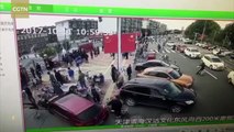 Car ploughs through a crowd of people,  4 injured