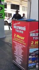 Live streamer 'Hampton Brandon' runs from guy with a stool and gets hit by a car