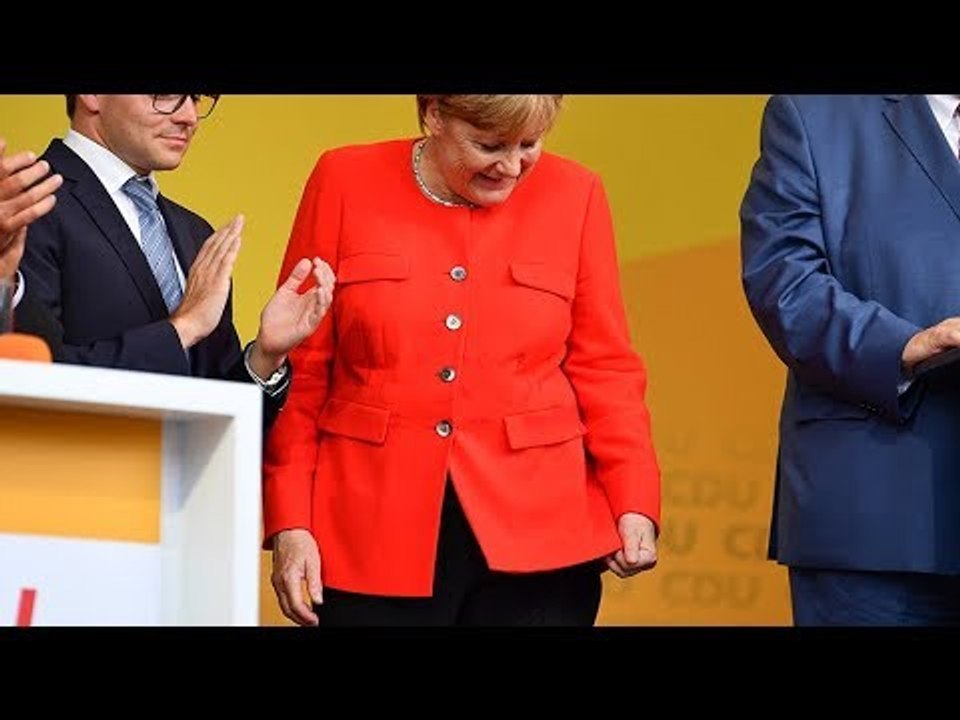 Merkel booed, pelted with tomato on campaign trail in eastern Germany
