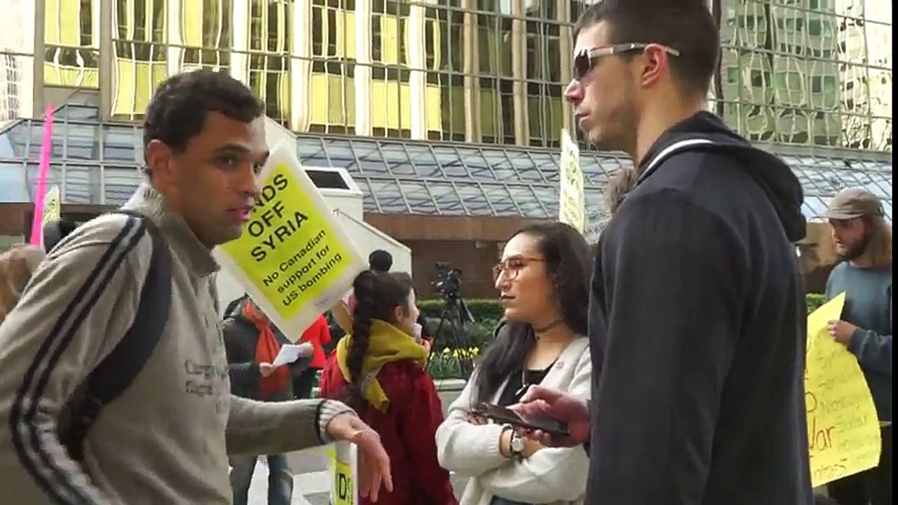 Squatting Slav TV at Syria protest triggers SJWs in Vancouver Canada