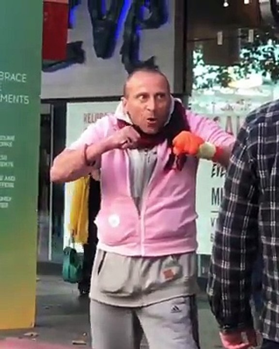 Man throws up fists for a fight Dailymotion Video