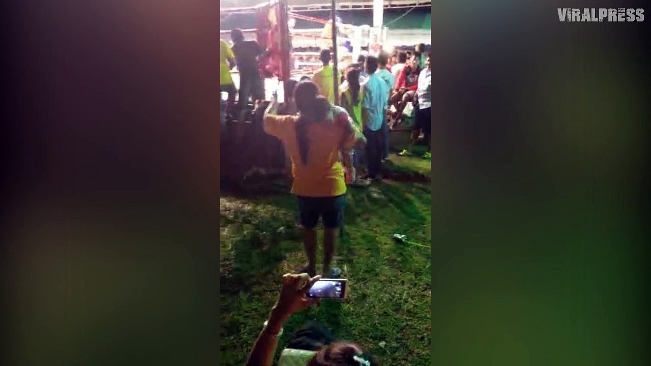 Woman Gets Carried Away Watching Boxing....