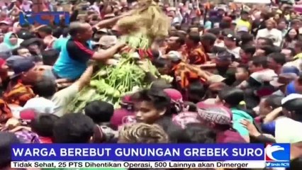 下载视频: Sejumlah Anak Terjepit saat Berebut Gunungan Grebek Suro Banyumas