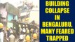 Bengaluru : 4 story building collapse, many feared trapped | Oneindia News