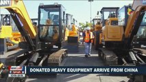 Donated heavy equipment arrive from China
