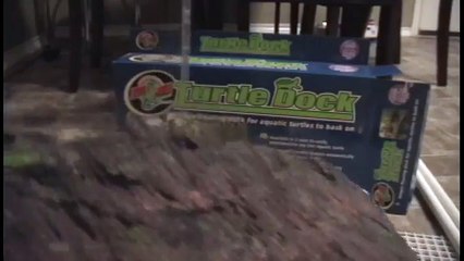 How to make a cheap and pretty basking area for a turtle.