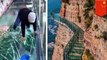 Skywalk kaca di Cina: Skywalk kaca Taihang seakan-akan retak ketika anda berjalan, kenapa?- TomoNews