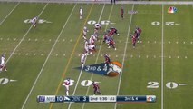 Denver Broncos quarterback Trevor Siemian scrambles up the middle for first down