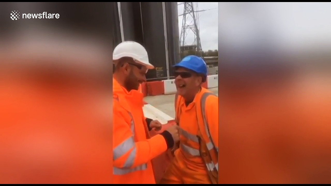 Construction workers pull colleague's tooth with string