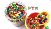 Learn ABCs with Hide and Seek Cartoon Letters Inside Giant Candy Jar with Gumballs and Skittles