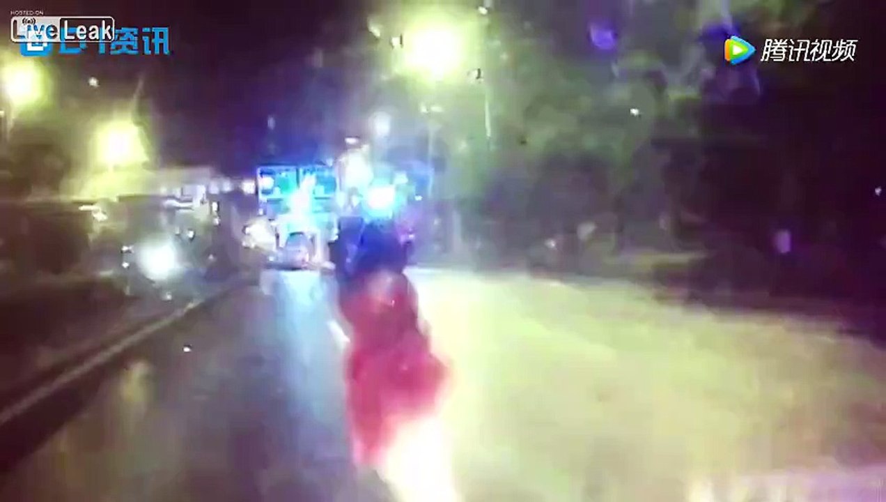 Woman standing in the middle of the road is killed by a car