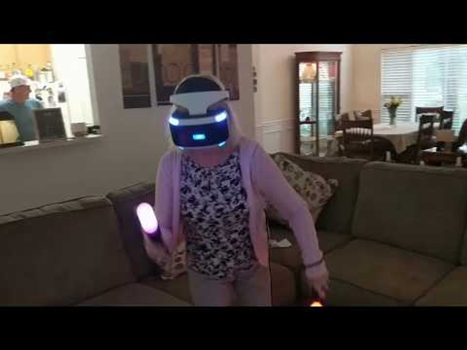 Enthusiastic Grandparents Play Virtual Reality Video Game