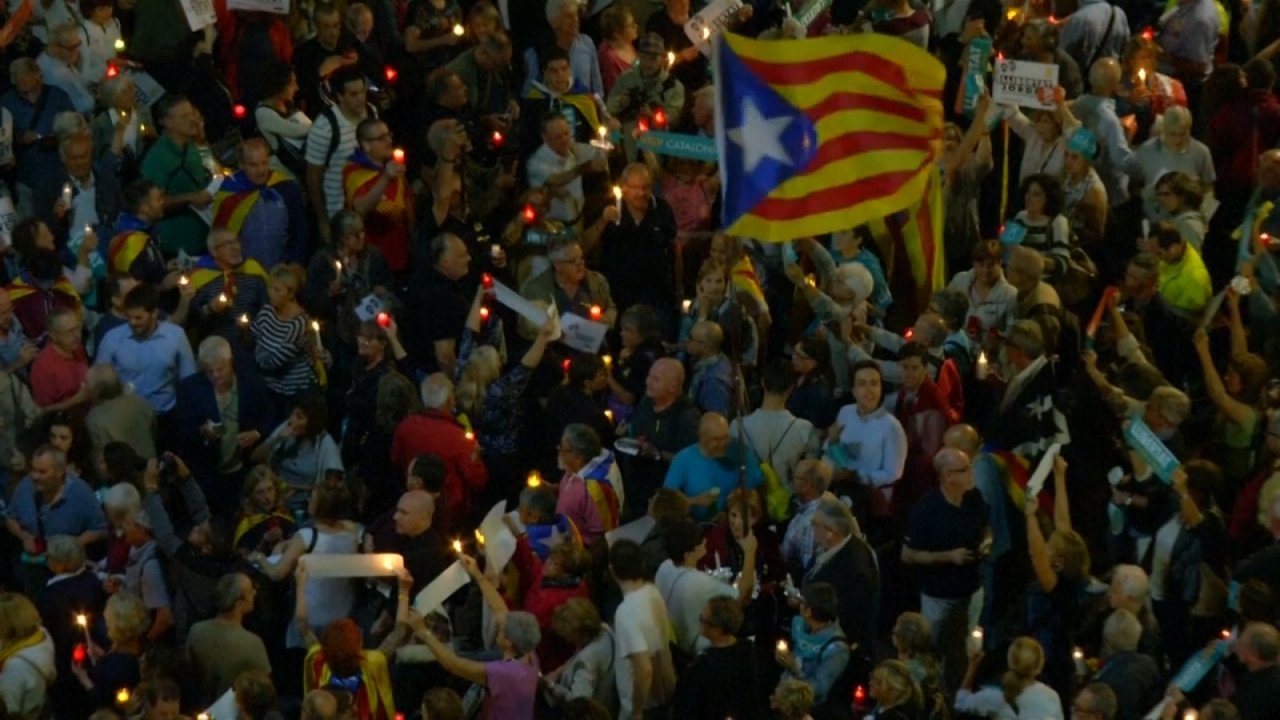 Tens of thousands rally in Barcelona as Spain's political crisis deepens