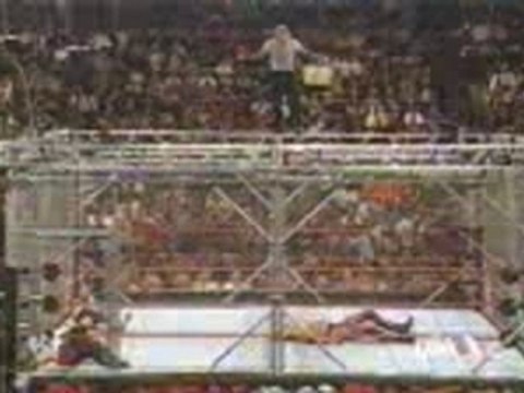 Jeff Hardy tries to nail a Senton Bomb off cage and misses