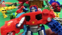 Transformers Rescue Bots Optimus Prime Bumblebee Dinobots Battle the Dinotrux in Robot Battle Slam