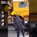 Motorcyclist gets ran on and dragged by a dump truck