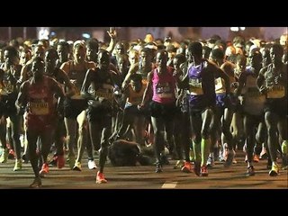 Kenenisa Bekele falls at the start of the 2017 Dubai Marathon