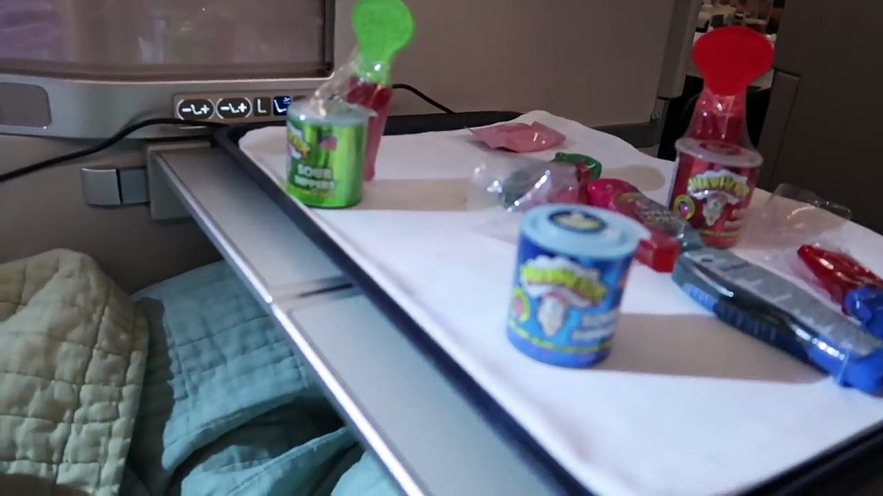 KIDS REACT! Extreme Sour Warheads Candy Challenge On A Plane! Business Class Airplane Flight