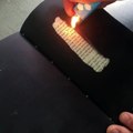 To read Fahrenheit 451, you have to heat the pages with a flame