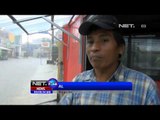 NET24 - Sebuah truk terguling di Depok akibat hujan deras