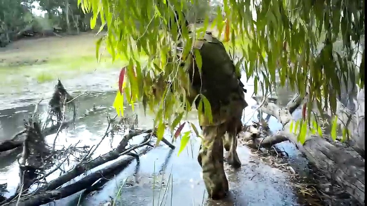 Crocodile attacks pig hunters in Northern Territory Australia. Croc loses.