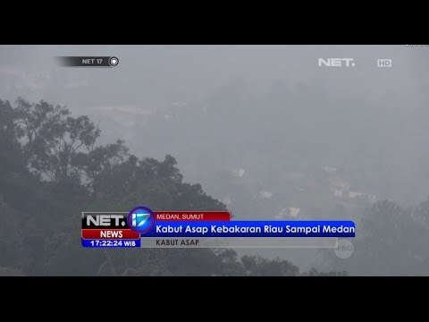 NET17 - Kabut asap semakin tebal menyelimuti Kota Medan yang berasal dari kebakaran hutan Riau
