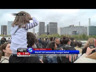 NET5 - Aksi akrobat meniti tali sebrangi Sungai Seine di Paris