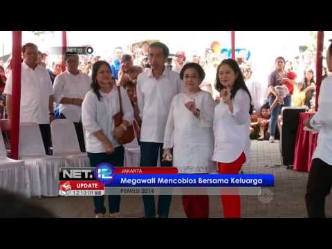 NET12 - Live Report - Ketua Umum PDIP Megawati gunakan hak pilihnya didampingi capres Jokowi