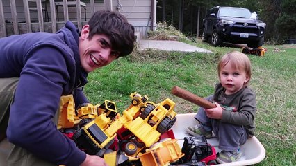 Toy Construction Trucks Take a Ride through the Forest