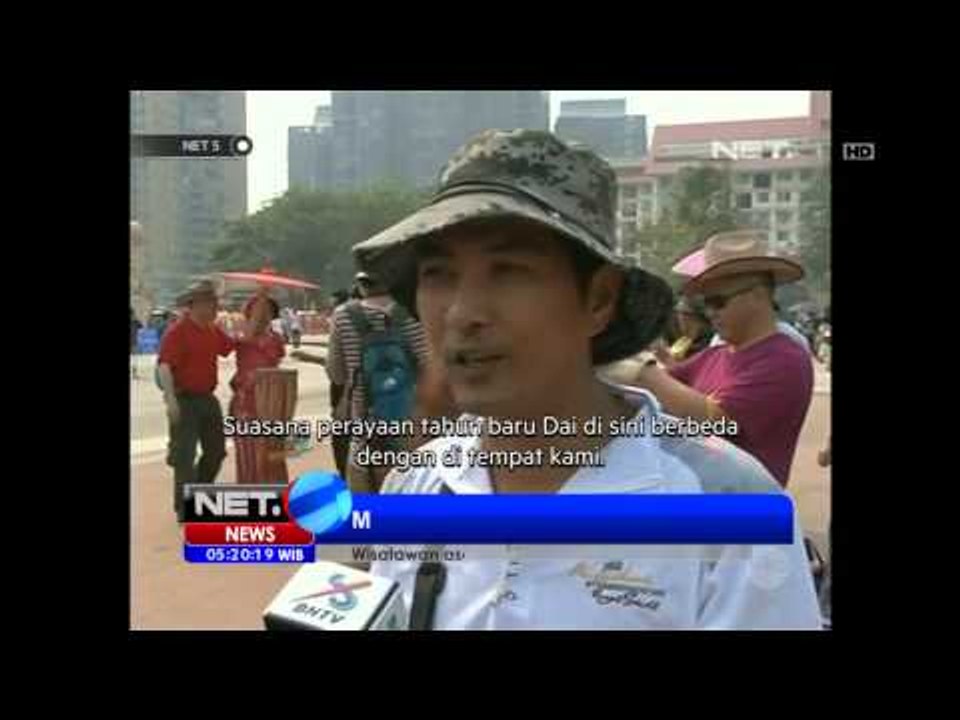 NET5 - Rekor Dunia Ribuan Orang Menari Payung d...