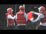 Aksi Unik Upacara Bendera di Tengah Sungai Ciliwung -NET12