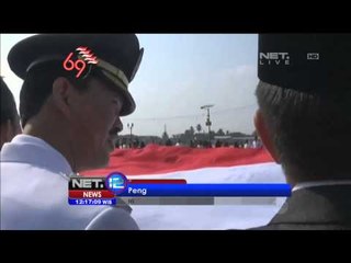 Bendera Merah Putih Raksasa Dijahit Tangan oleh 2000 Pemuda Palembang -NET12