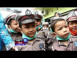 Siswa PAUD Bagikan Masker di Palembang Terkena Kabut asap - NET12