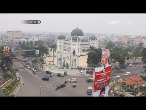Kabut asap di Riau menipis setelah hujan sementara di Medan masih tebal - NET12