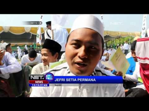 Ribuan santri dan pelajar gelar menulis al-quran massal - NET12