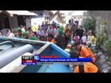 TNI dan PolrI berikan bantuan air bersih untuk warga Dayeuhkolot Bandung - NET12