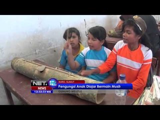 Descargar video: Komunitas Pecinta Alat Musik dan Fotografi Karo Hibur Anak-anak Korban Erupsi Sinabung -NET12