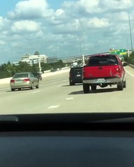 Red Truck Swerves Uncontrollably Causing Accident