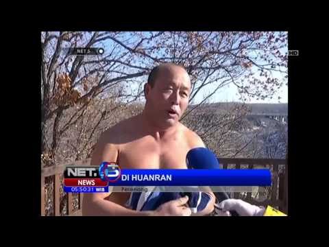 Sensasi Berenang di Sungai Beku di Cina - NET5