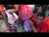 Petugas Evakuasi Warga yang Terjebak Banjir di Sampang - NET12