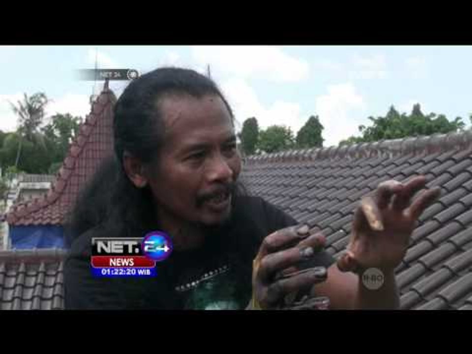 Sambut Tahun Baru 2016, Seniman Melukis Diatas Genting - NET24