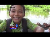 Sekolah Terkepung Banjir, Puluhan Siswa Sekolah Madrasah Dilamongan Berangkat Dengan Perahu - NET5