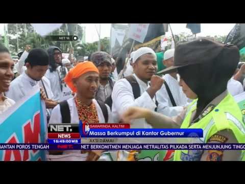 Aksi Damai di Samarinda, Polwan Bagikan Permen untuk Pendemo - NET16